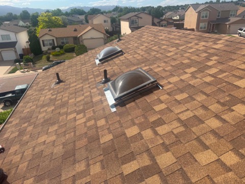 Finished roof replacement with skylights and new pipe boot flashing
